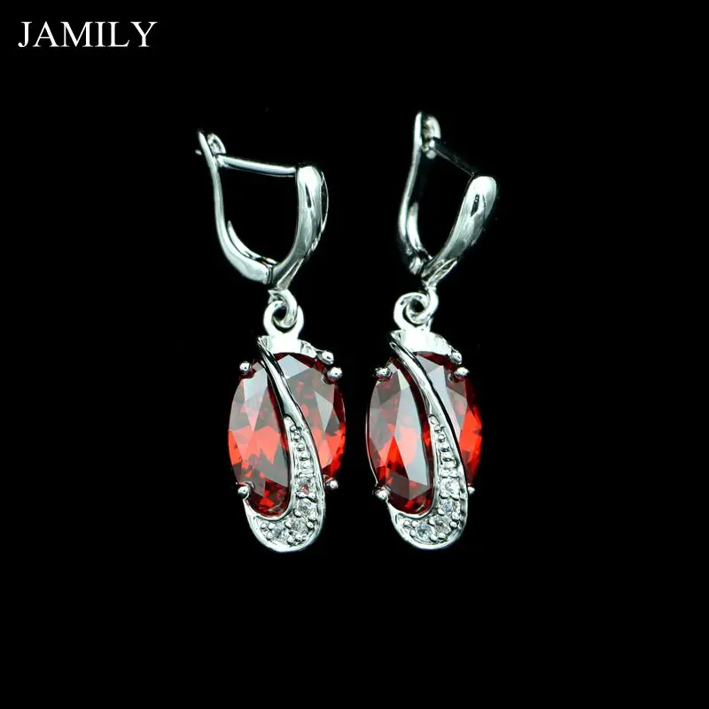 Женские серьги подвески из серебра 925 пробы с красным камнем и кубическим