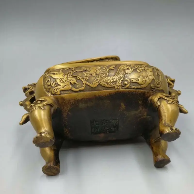 

Chinese Old Brass hand-made casting dragon hollow incense burner Xuande Year