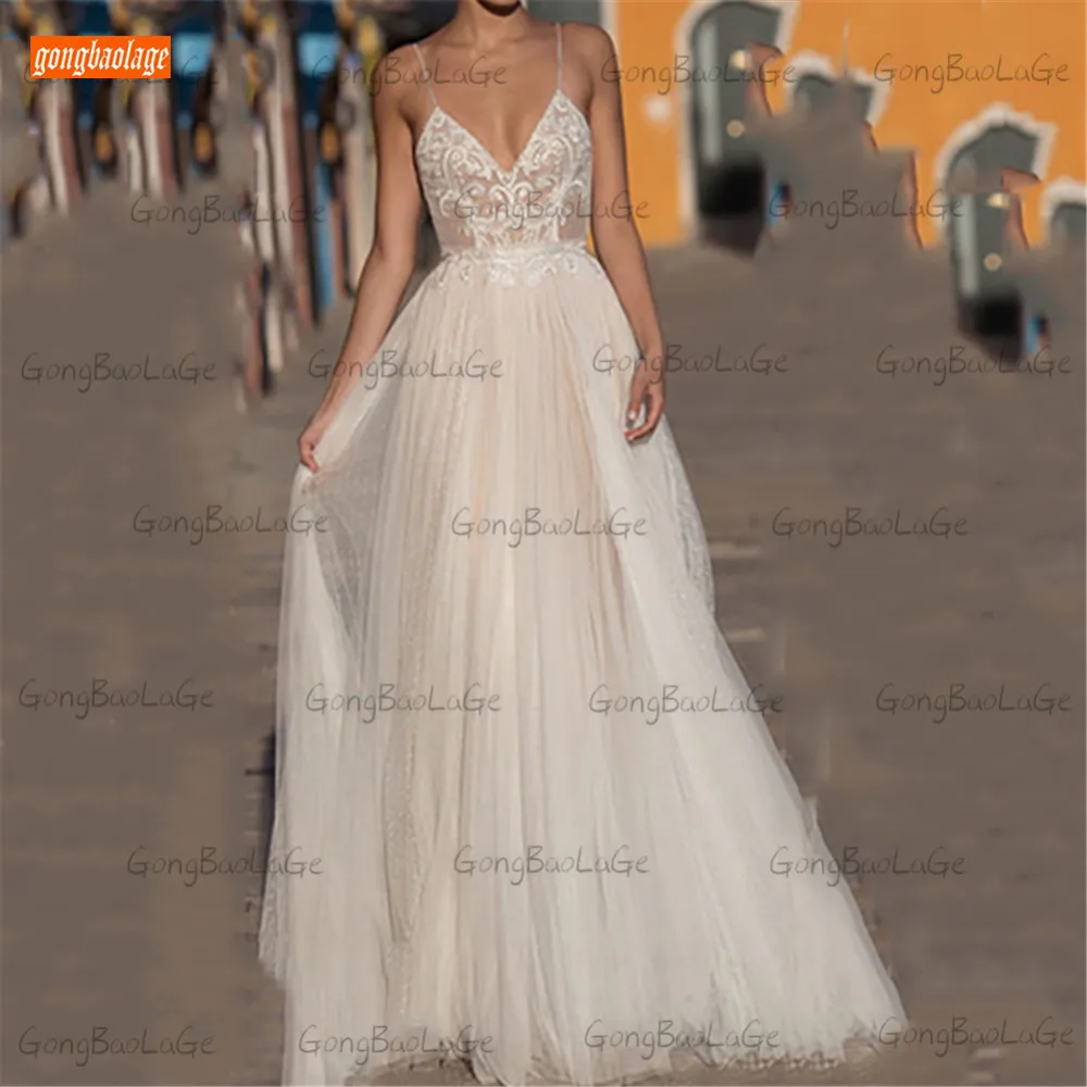 

Boho Ivory Wedding Dresses 2021 vestido de noiva Sleeveless Bohemian abiti da spos V Neck Backless Bridal Gowns Spaghetti Straps