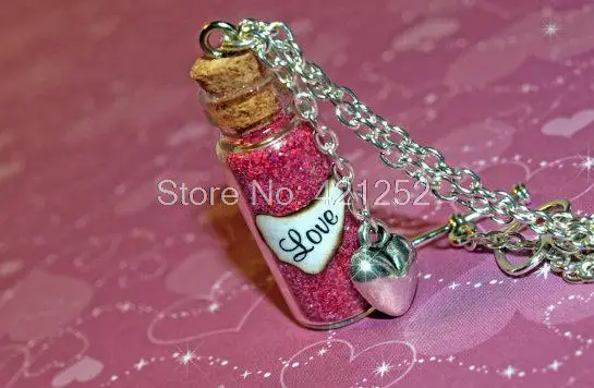 

12pcs LOVE The Most Powerful Magic of All Necklace with a Heart Charm bottle necklace in silver