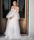 Свадебное платье принцессы светло-шампанского трапециевидного силуэта с открытыми плечами, пышными рукавами и открытой спиной, сказочное платье невесты 2021
