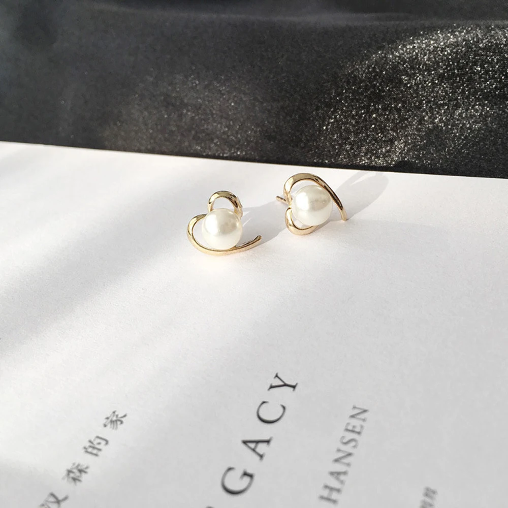 

Han edition Fashion Heart Stud earrings Contracted Bohemia Pearl Earrings Metal The geometric Hoop Earrings Women Party Jewelry