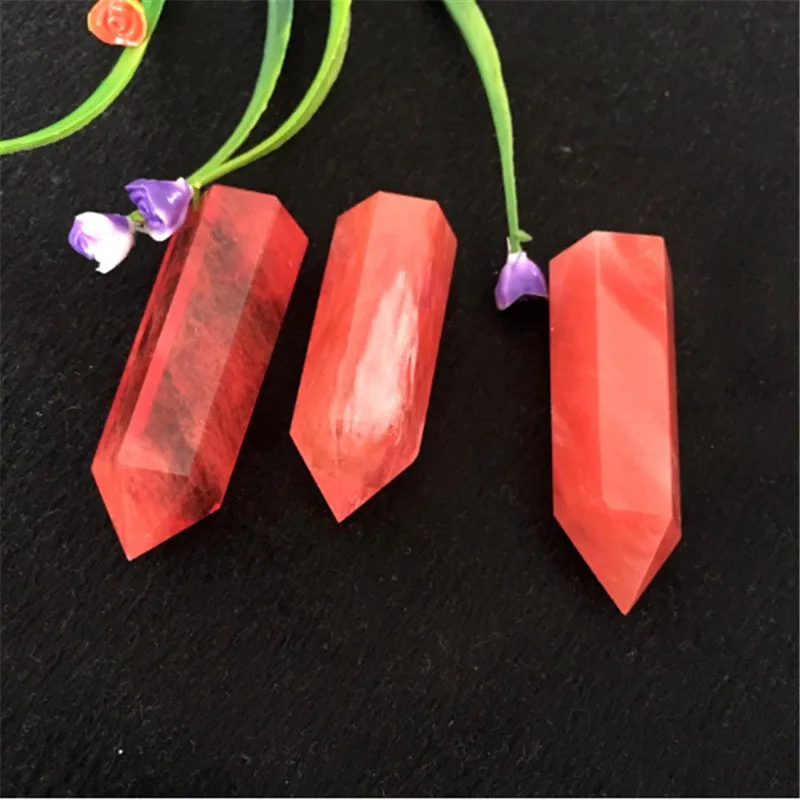 

Red smelting stone crystal column single pointed six prism rough stone grinding home decoration