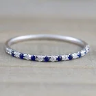 Кольцо из серебра пробы с платиновым камнем с круглым сапфиром 0,15 карата