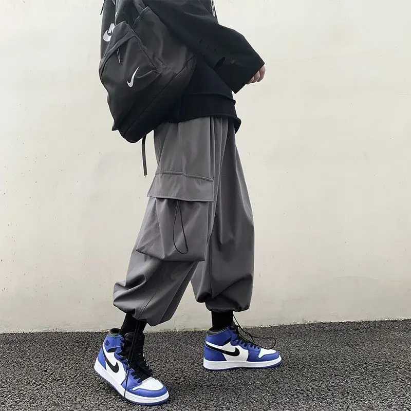 

Trendy new overalls male students all-match ins drawstring drawstring loose nine-point straight-leg pants, handsome casual pants