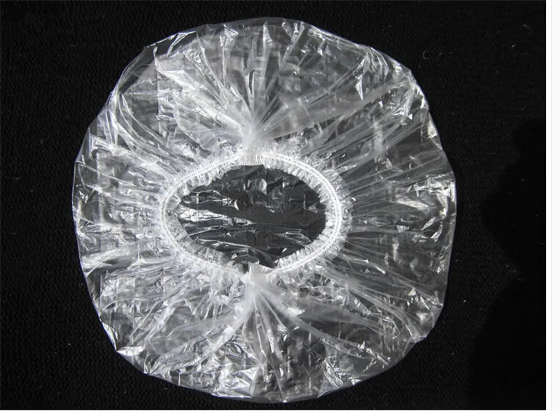 

New 100 Pcs/lot Bathing Elastic Caps Portable Disposable Clear Spa Hair Salon Shower Caps Home Shower Hats