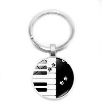 2020 new dog paw piano keychain jewelry silver keyring glass convex shoulder bag pendant keychain music gift