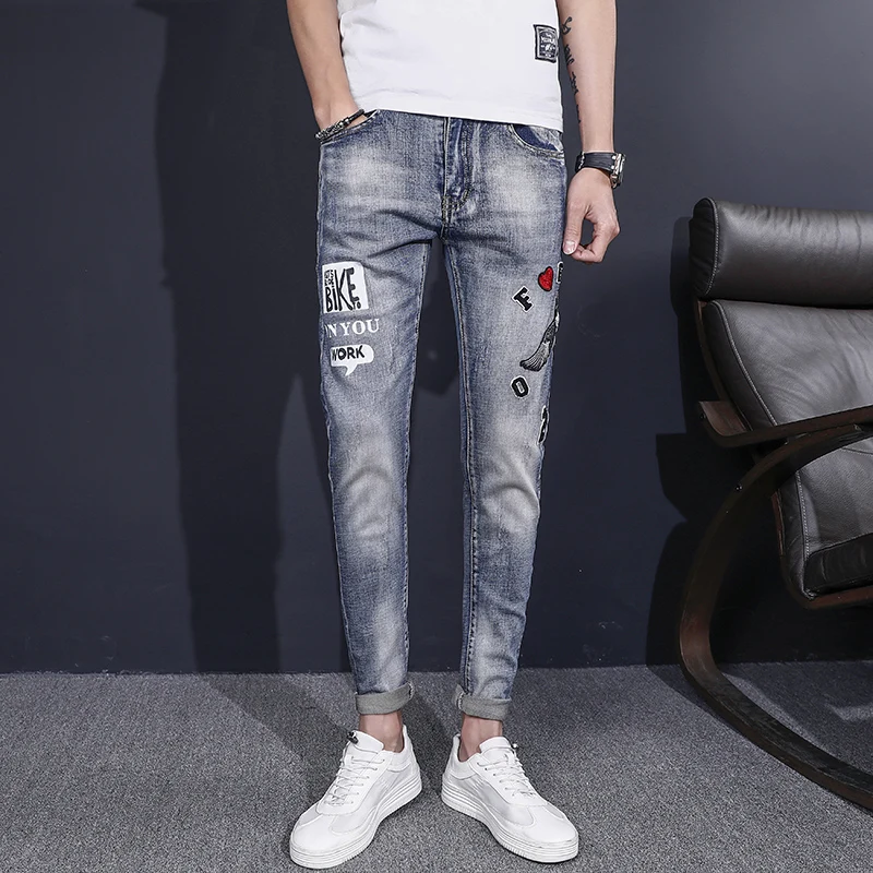 Весенние и осенние мужские джинсы с принтом в европейском американском стиле