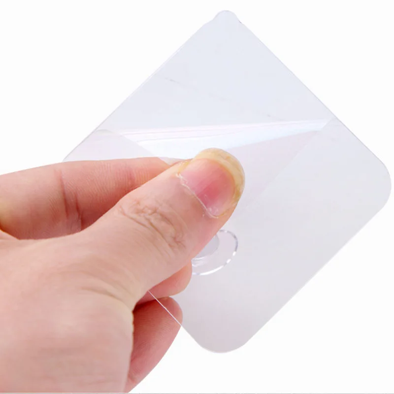 

2pcs Wall Storage Hook Punch-free Power Plug Socket Holder Kitchen Stealth Hook Wall Adhesive Hanger Office Wholesale Price