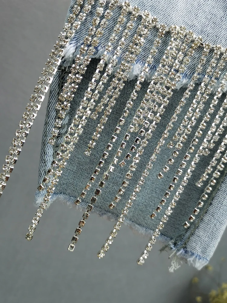 Джинсы женские облегающие синие тонкие эластичные с кисточками обтягивающие