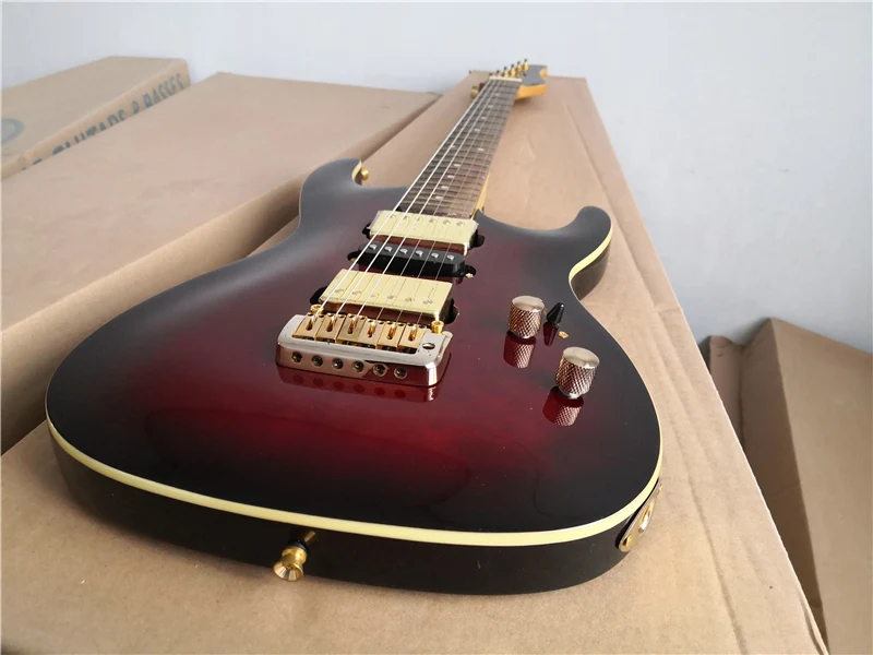 

custom 6 string guitar,red guitar,HSH pickups, white cream binding,tremolo bridge,rosewood fingerboard,gold button