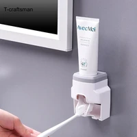 creative wall mount automatic toothpaste dispenser and small toothbrush holder toothpaste squeezer for family shower bathroom