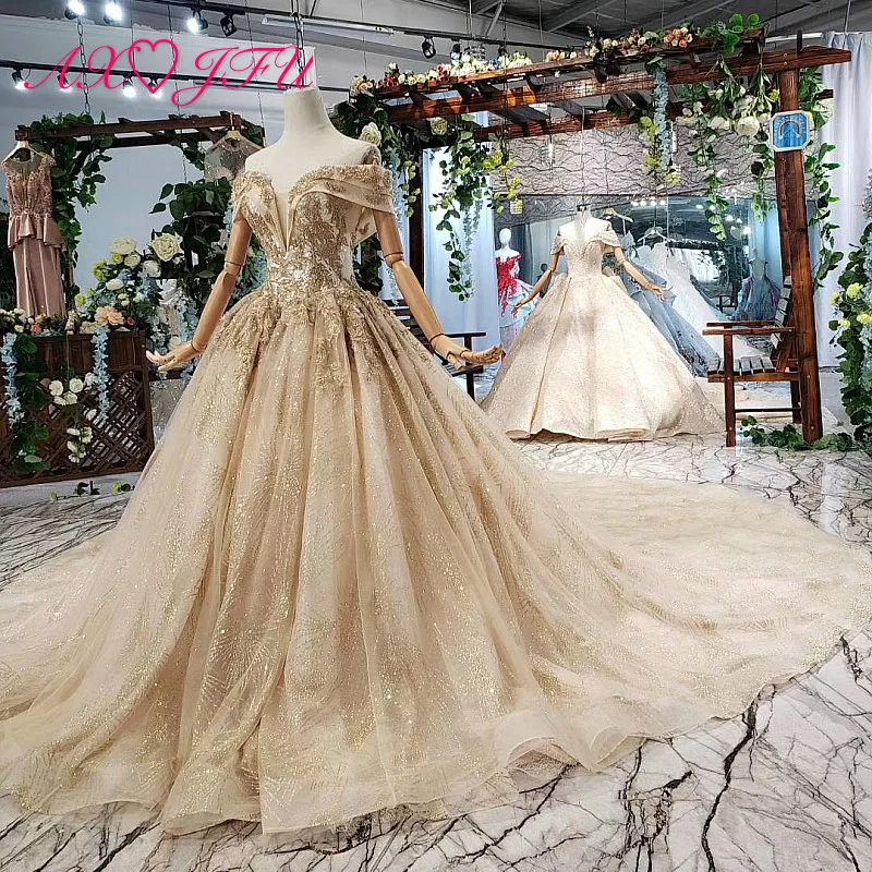 AXJFU Luxury princess golden flower lace boat neck beading crystal sparkly star bride tail wedding dress real photo 11669