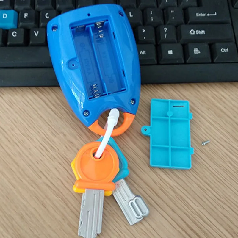 

Cartoon Baby Kids Musical Smart Remote Car Key Toy Car Voices Pretend Play Toys AN88