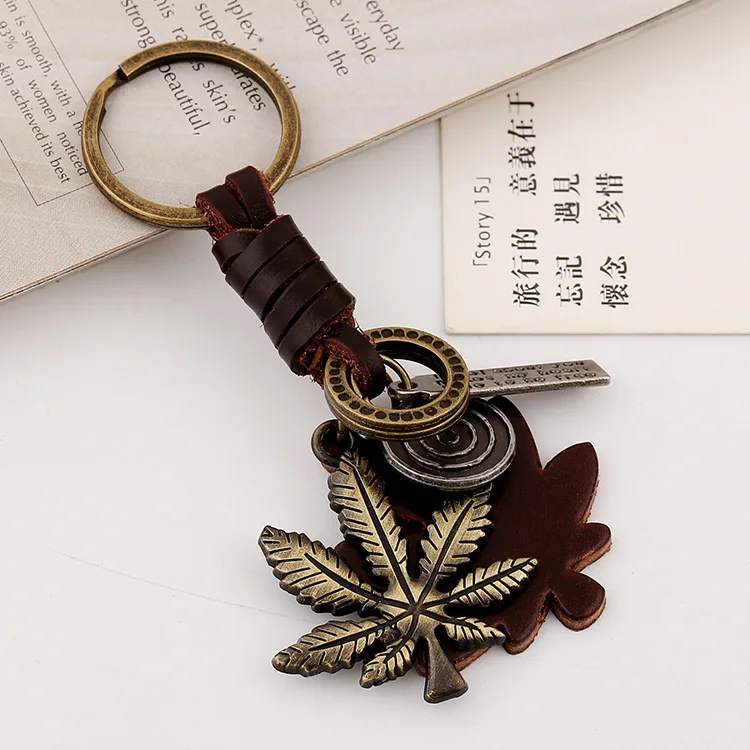 

WANGAIYAO jewelry atmospheric alloy maple leaf leather keychain retro woven men's leather keychain