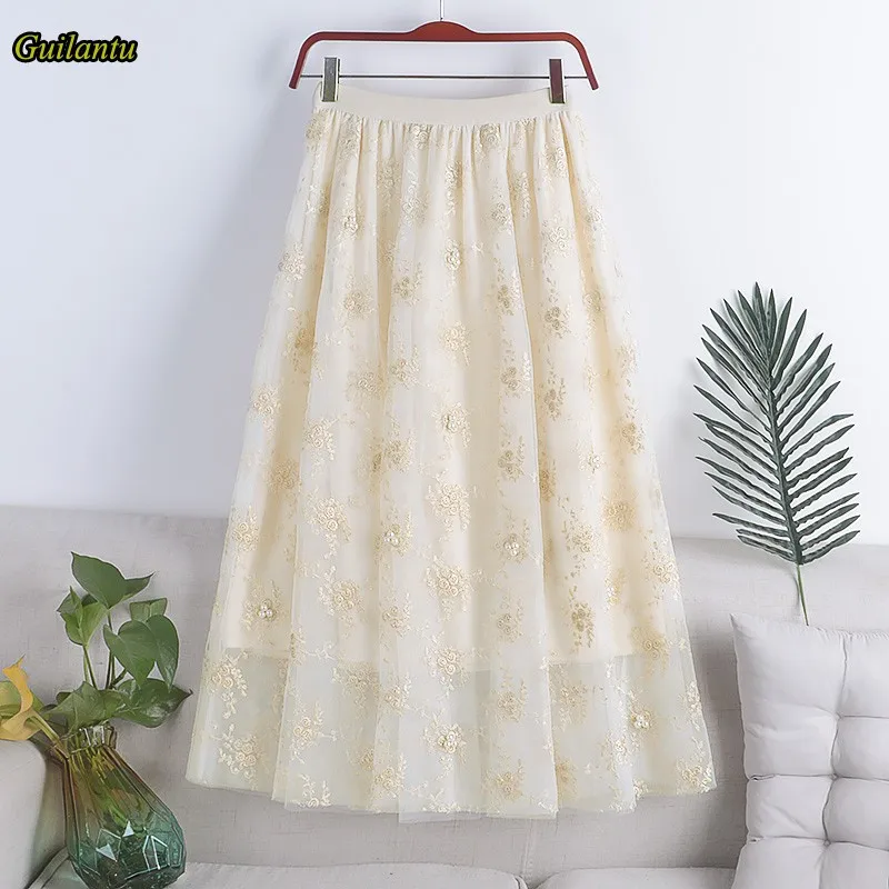 

Guilantu/весенне-летняя длинная юбка с цветочной вышивкой и бисером в Корейском стиле; Женская одежда; Эластичная юбка трапециевидной формы с в...