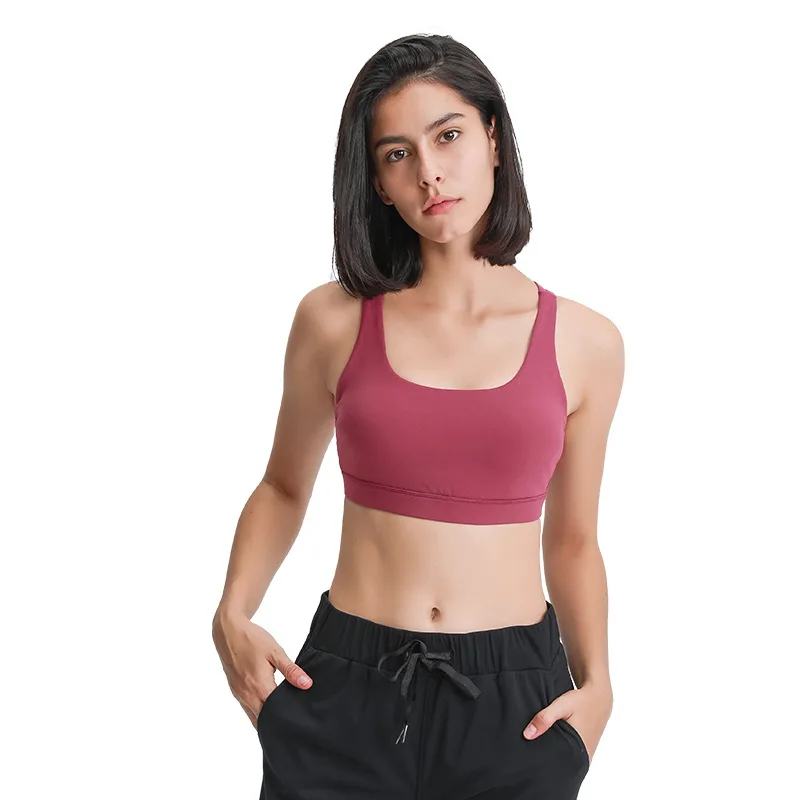 

The new double cross straps gather up the sports bra, solid color sanding training fitness sports underwear
