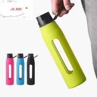 portable sport and fitness borosilicate glass water bottle with twist cap soft silicone sleeve carry handle for bicycle gym yoga