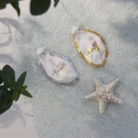 free shipping20pcsboxnatural oyster shell place card for beach wedding natural shell conch reception table chic decor
