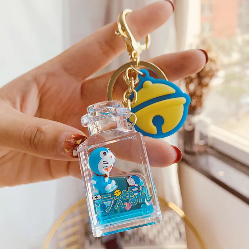

New Kawayi Japan Anime keychain Quicksand keychain Liquid Floating Ring Robot Cat Figurine Tassel Car keyring Doraemon Keyring