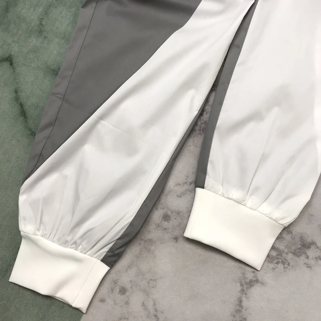 

2021 New Men's Trousers Thin Section Breathable Fabric Stitching Craftsmanship Casual Style Pocket Decoration Jogging Pants