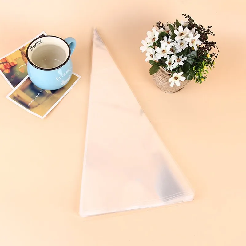 

50pcs/Lot DIY Candy Bag Wedding Favors Birthday Party Decoration Sweet Cellophane Transparent Cone Storage With Organza Pouches