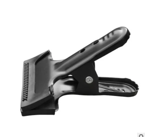 Фотооборудование. Вспомогательный зажим для камеры энергичный