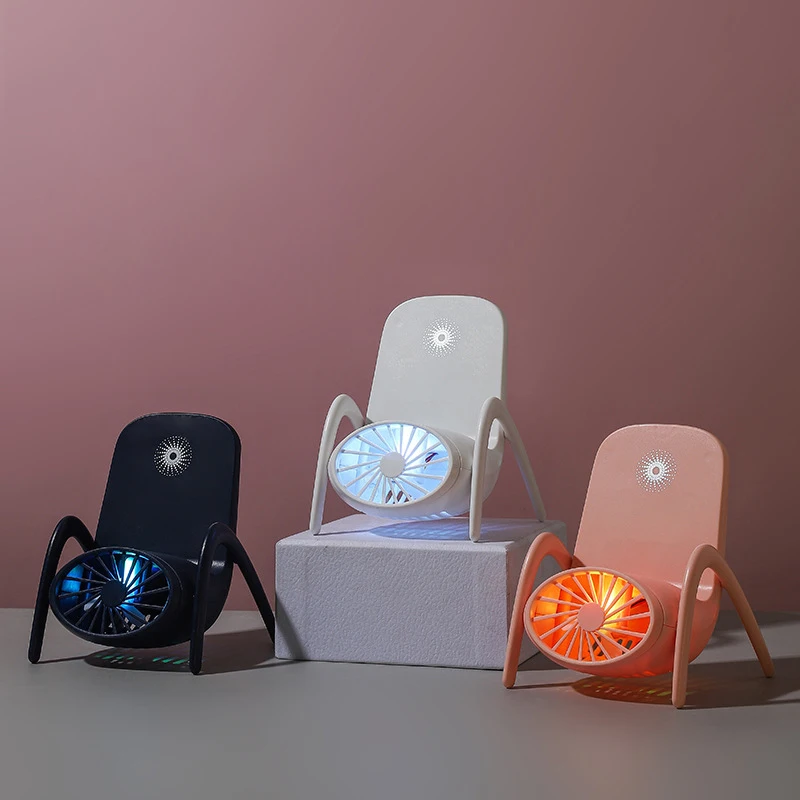 

Multi-function Mini Fan With Personalized Colorful Night Light Electric Portable Handheld Fan With Mobile Phone Bracket Function