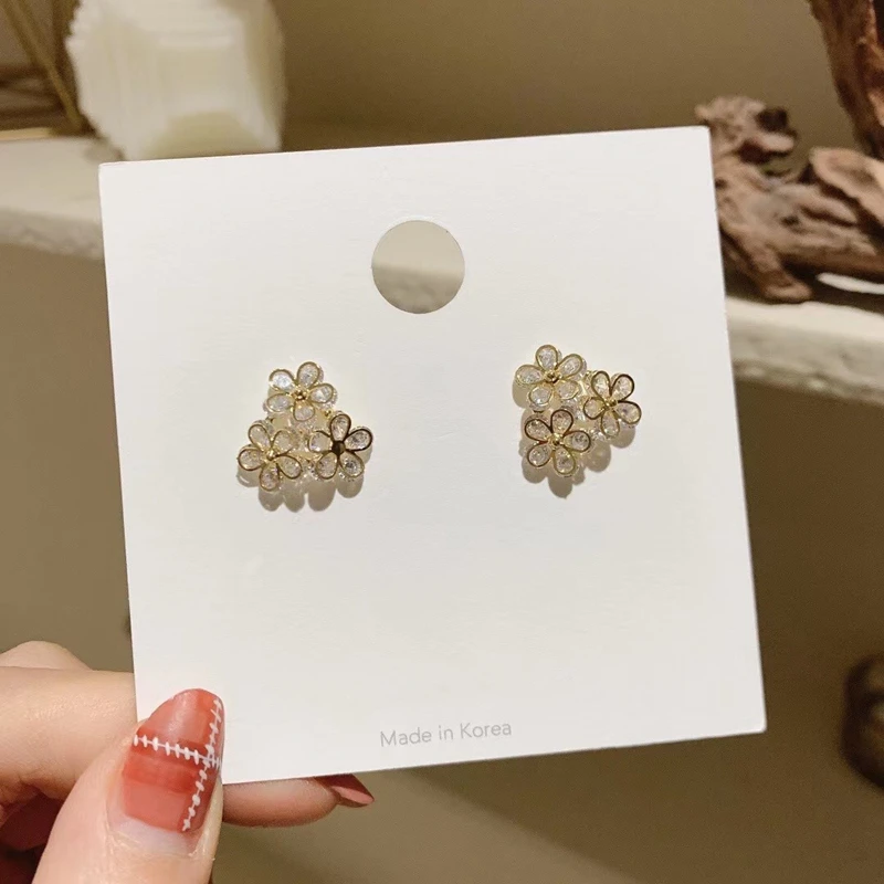 

MENGJIQIAO Korean Cute Delicate Zircon Flower Stud Earrings For Women Sweet Hollow Metal Petal Oorbellen Accessories Jewelry
