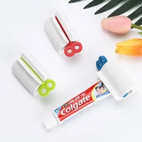bathroom accessories toothpaste dispenser multi functional tooth paste tube squeezer rolling holder banheiro tandpasta knijper