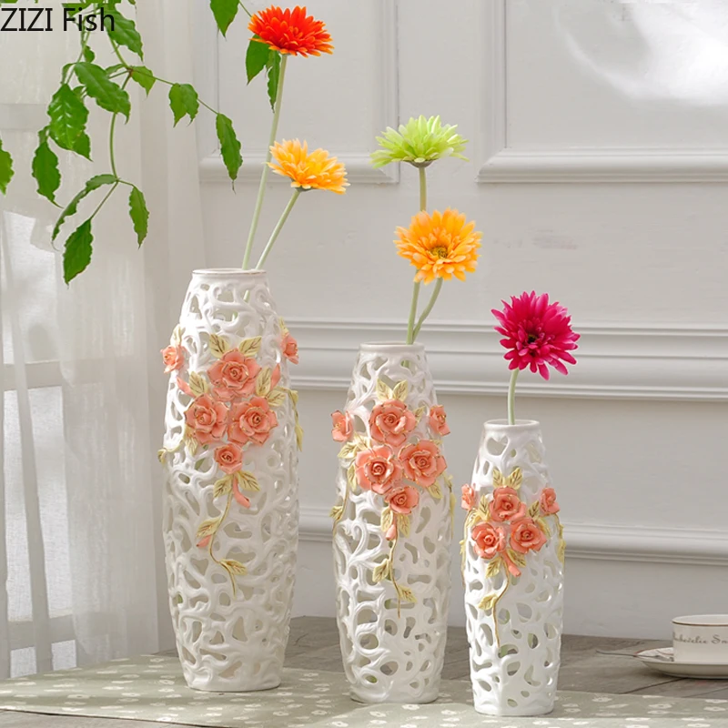 

Creative White Ceramic Vase Hollow Out Embossed Flowers Handmade Flower Arrangement Accessories Home Decoration Ceramic Crafts