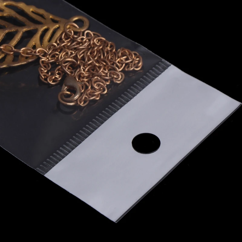 

100Pcs/Set Plastic Packing Bag Transparent Self Adhesive Jewelry Seal 5x18cm