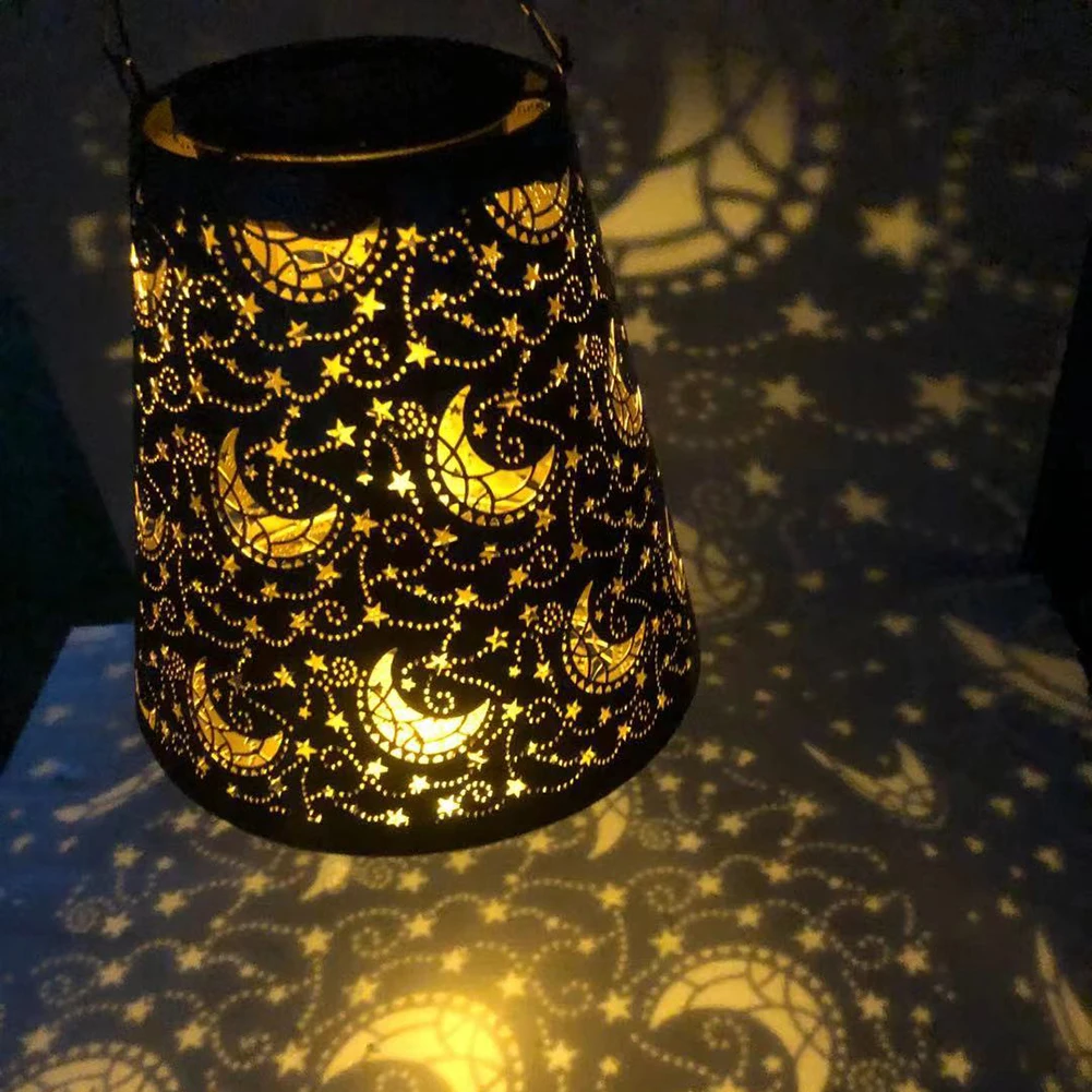 

Светодиодный светильник на солнечной батарее, полый фонарь, проекционный светильник в виде Луны и звезды, кованые железные подвесные лампы,...