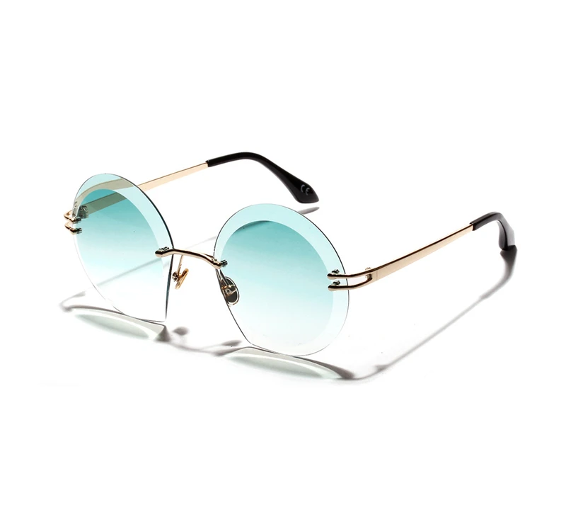 Модные солнцезащитные очки без рамки с большим круглым вырезом женские в стиле