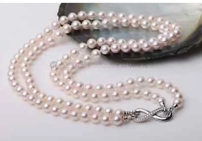 

Charming 2 rows 8-9 mm round white pearl necklace 18"19"