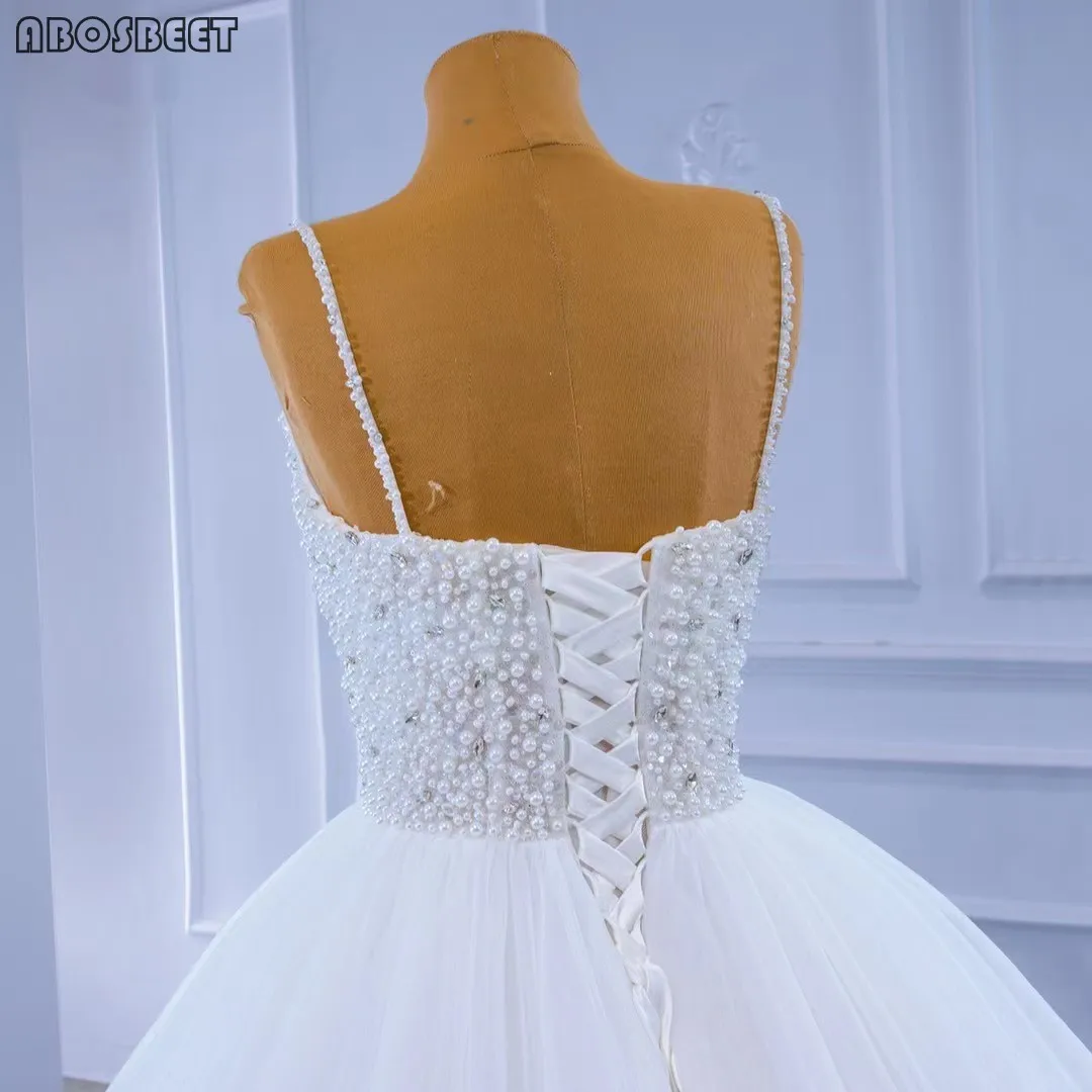 

Luxury Wedding Dress Ball Gown with Ruffles Elegant Wedding Dress for Bridal 2021 with Long Train Beads Top Spaghetti Straps