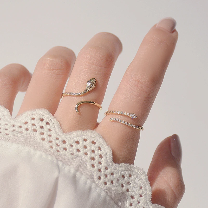 

Нежные ювелирные изделия из золота 14к с покрытием регулируемый хрустальные кольца в виде змейки Для женщин простой Стиль кубический циркон...