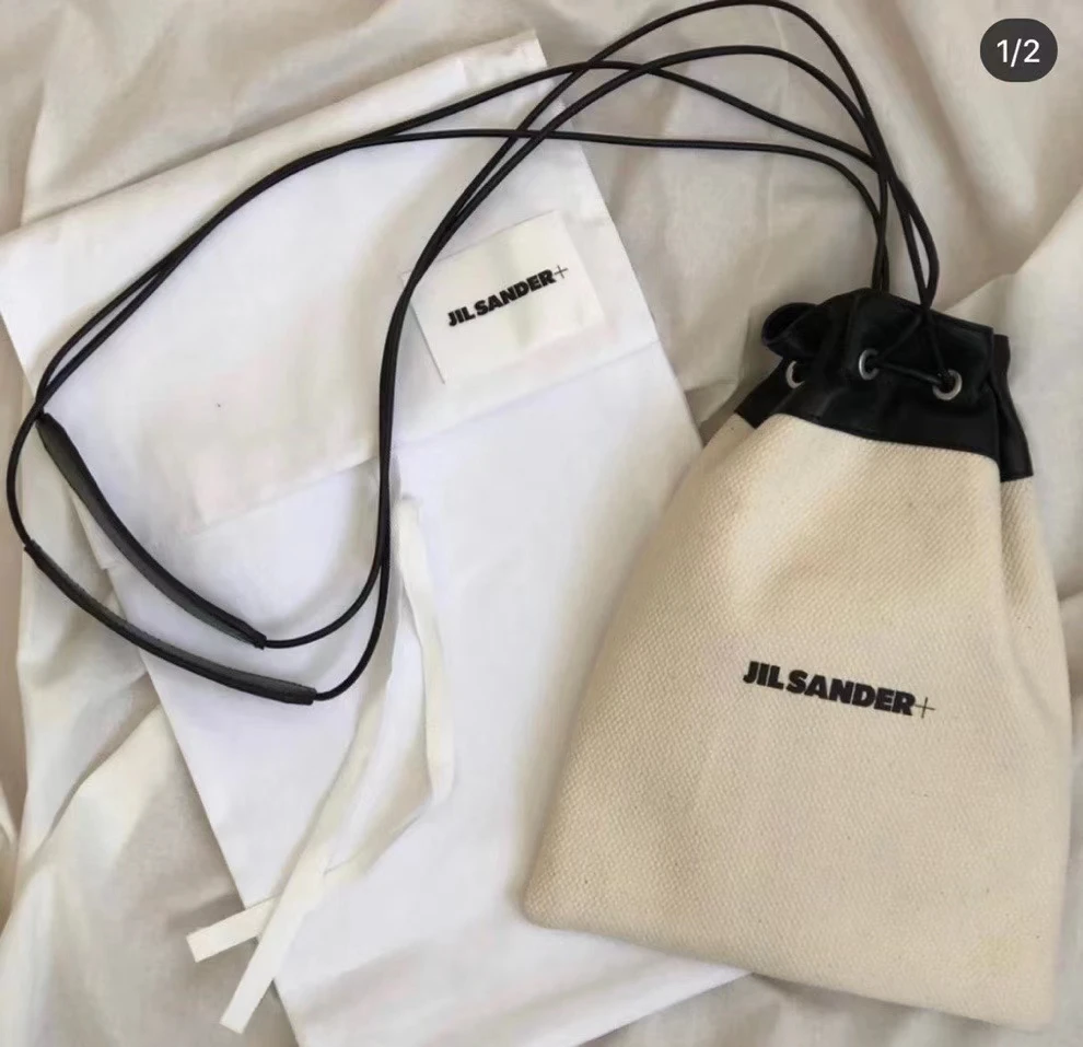 

Fashion versatile high quality Jil sander canvas dumplings patent leather for men and women women handbags