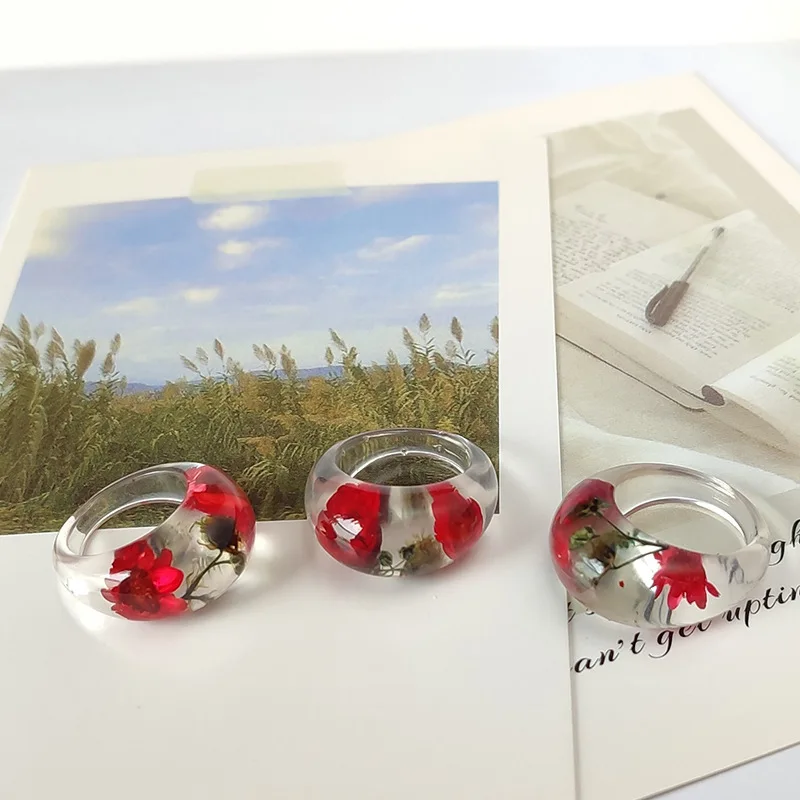 

Hot Sale Handmade Wood Resin Ring Dried Flowers Plants Inside Jewelry Resin Ring Transparent Anniversary Ring for Women Gift