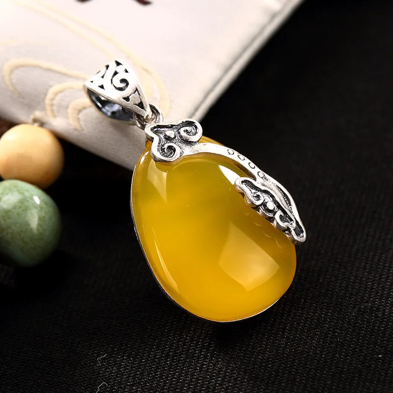 Большой камень из серебра S925 пробы желтый Хамбер Израиля в форме капли воды |