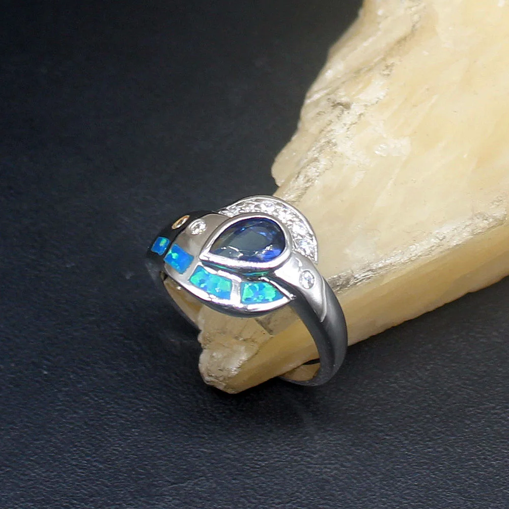 

Женское кольцо из серебра 925 пробы с опалом и сапфиром