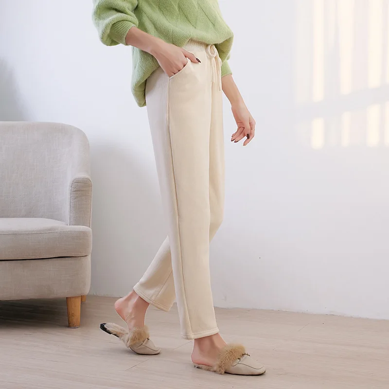 Утепленные зимние женские брюки с норковым пухом свободные мягкие эластичные