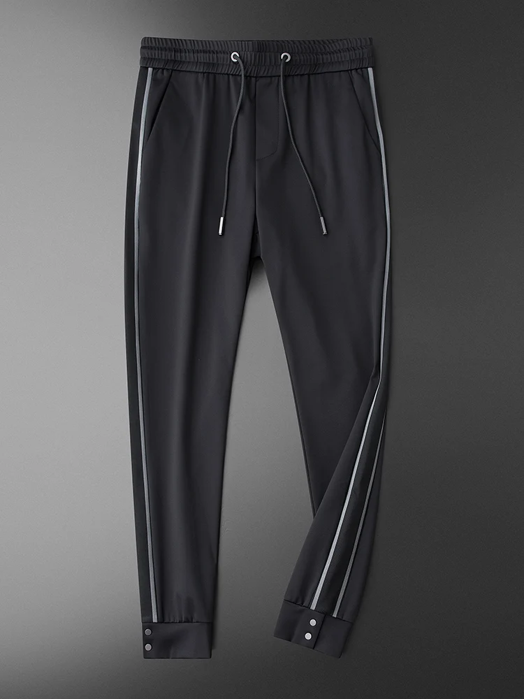 

Мужские повседневные спортивные роскошные черные мужские брюки с эластичной резинкой на талии, модные облегающие мужские брюки размера пл...