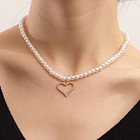 light luxury style imitation baroque pearl micro inlaid diamond hollow heart necklace female fashion accessories