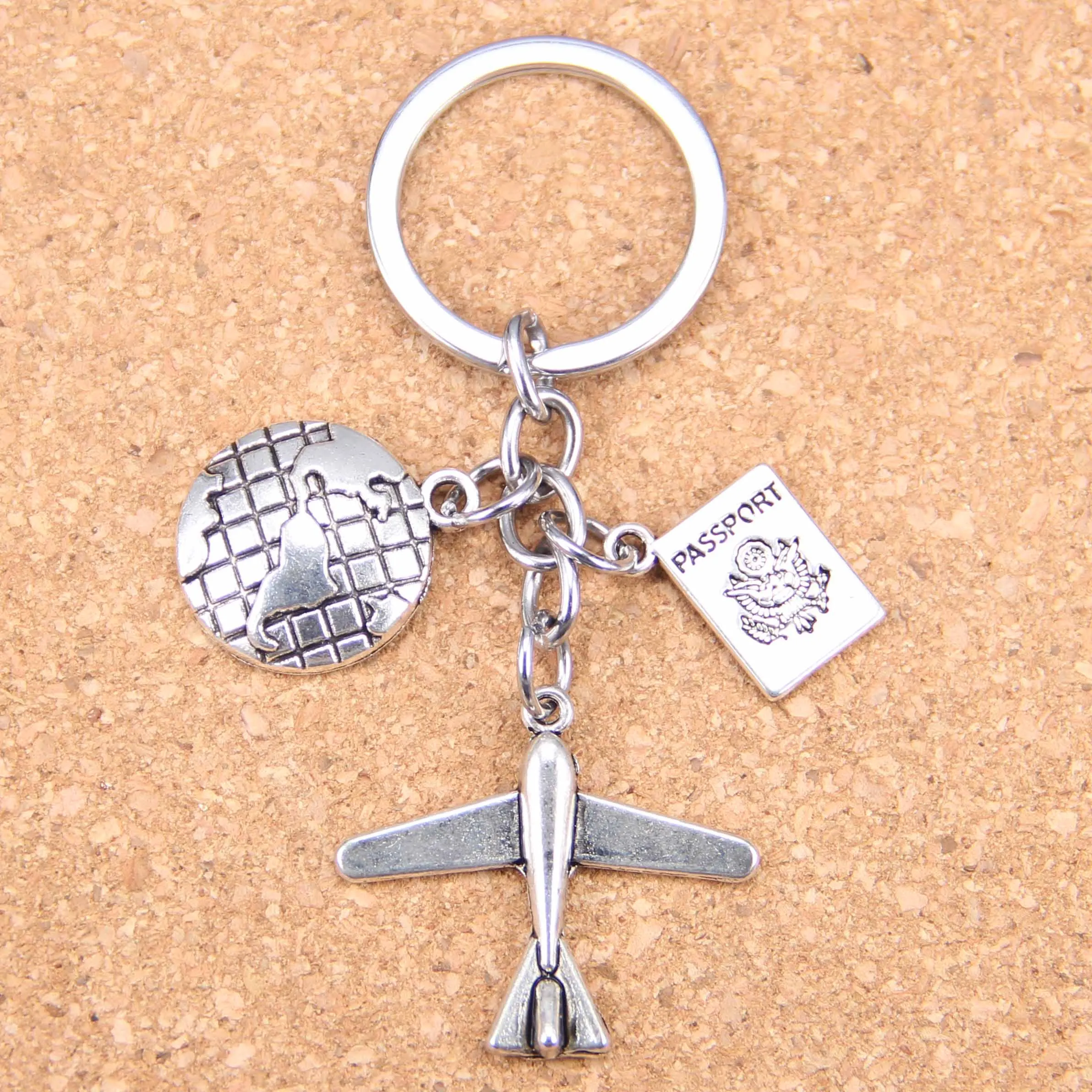 

20pcs New Fashion DIY Keychain plane airplane earth passport boy girl lover Pendants Men Jewelry Car Key Chain Souvenir For Gift