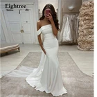 Белое мягкое длинное свадебное платье с юбкой-годе, открытыми плечами и короткими рукавами