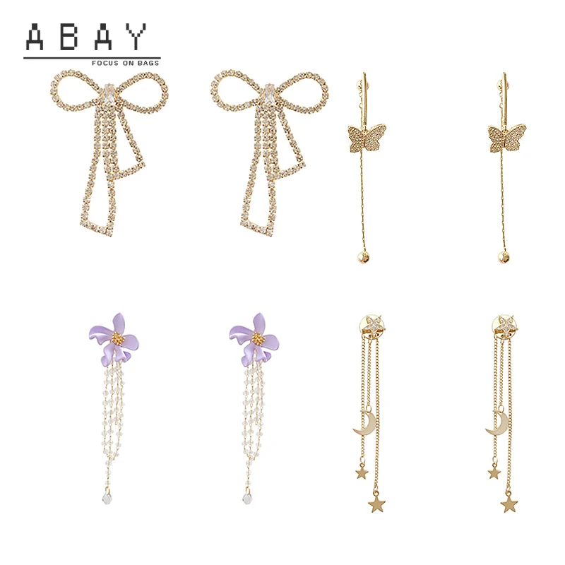 

S925 Silver Needle Micro Inlaid Zircon Flower Ear Pendant Female 2020 New Long Butterfly Pearl Tassel Design Sense Earrings