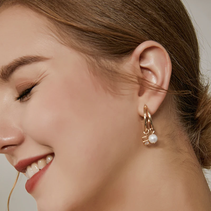

Gii 925 Sterling Silver Earrings Female European And American Pearl Asymmetric Metal Earrings Temperament Earrings 2021 New Wave