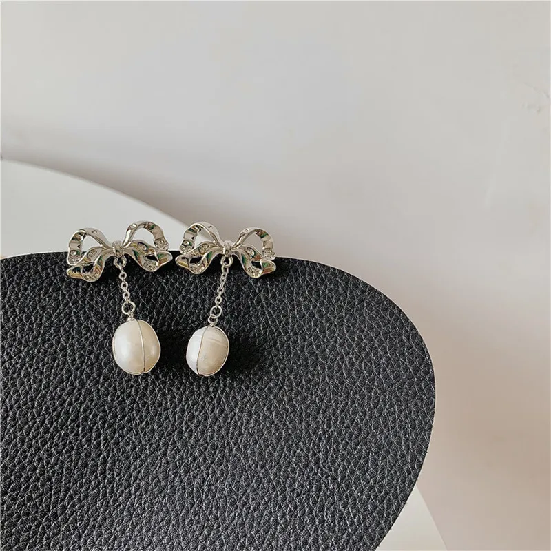 

Elegant Silver Color Bowknot Pearl Drop Dangle Earring for Women Ladies Metal Geometric Pendant Earrings Party Jewelry