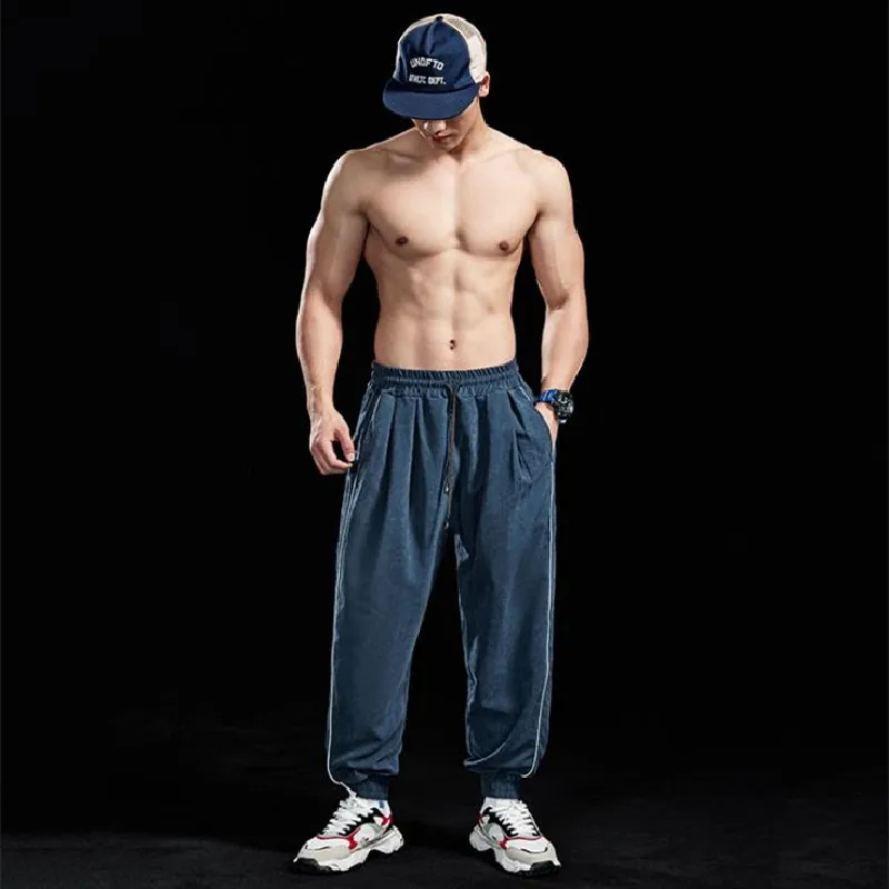 

2021 Fitness Blockade Trousers Men's Leisure Fashion Sports Running Loose Trousers Muscle Men's Thin Breathable Bunch Trousers